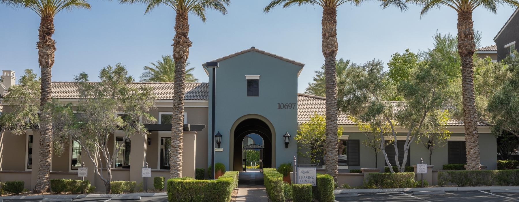 a building with palm trees