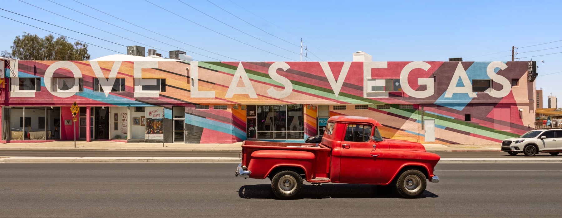 red truck in front of love Las Vegas sign