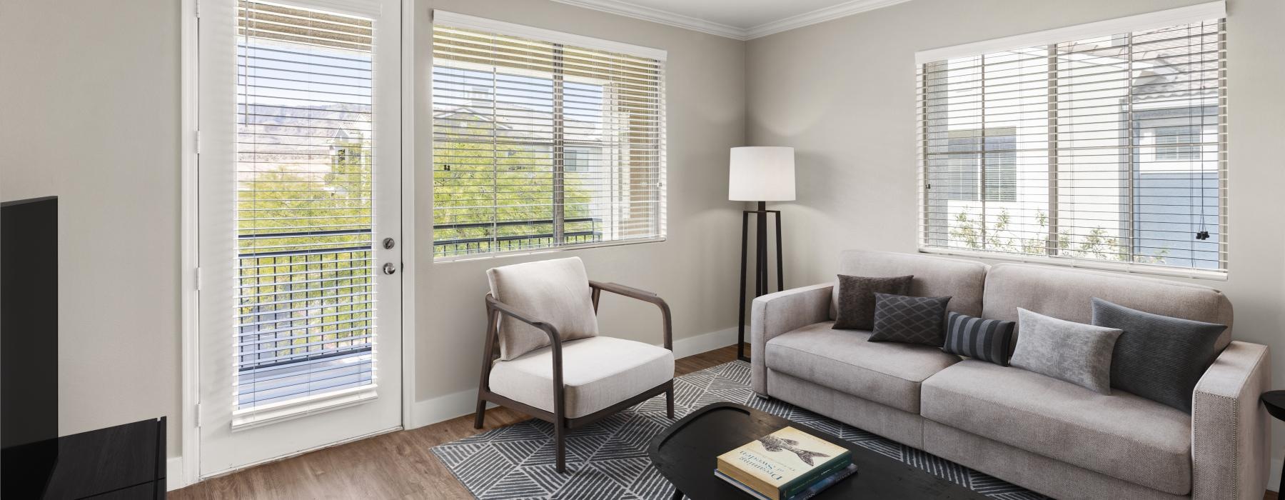 a living room with a couch and a table