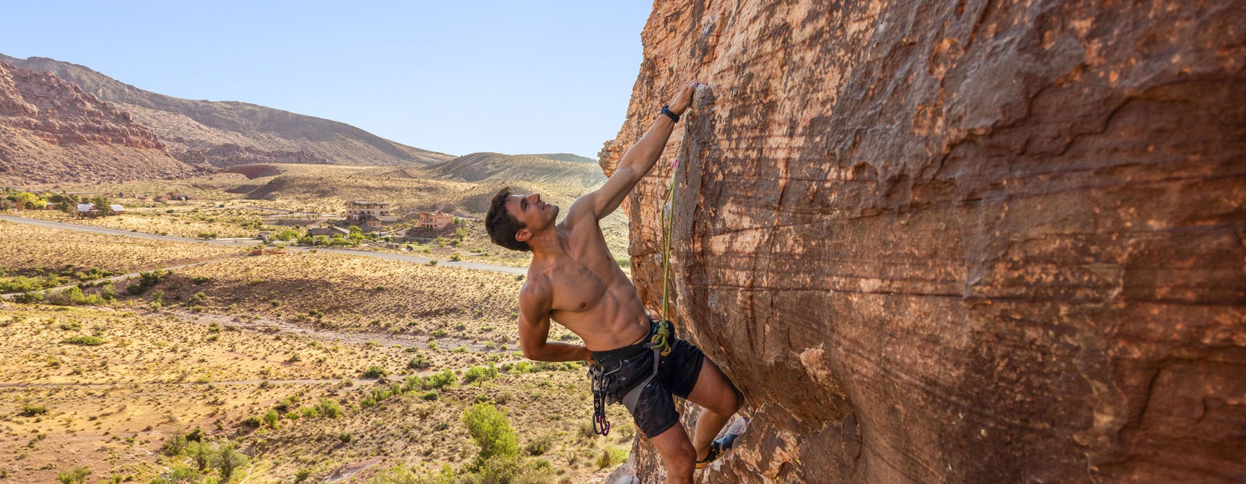 man rock climbing