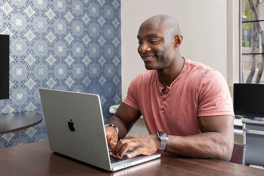 man working on laptop