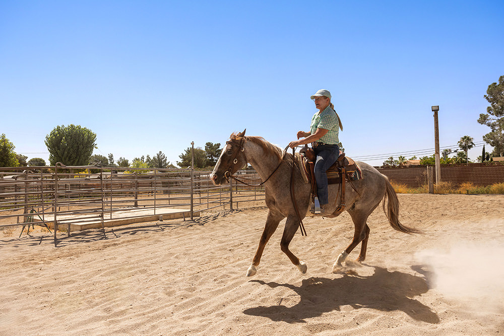 woman riding a horse